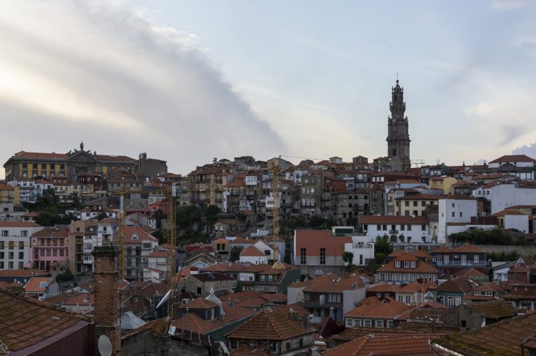 Viewpoint to Clerigos tower. Old houses, city of Porto